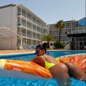 Megan girl image Ibiza on a mat in a pool Megan girl image Ibiza on a mat in a pool