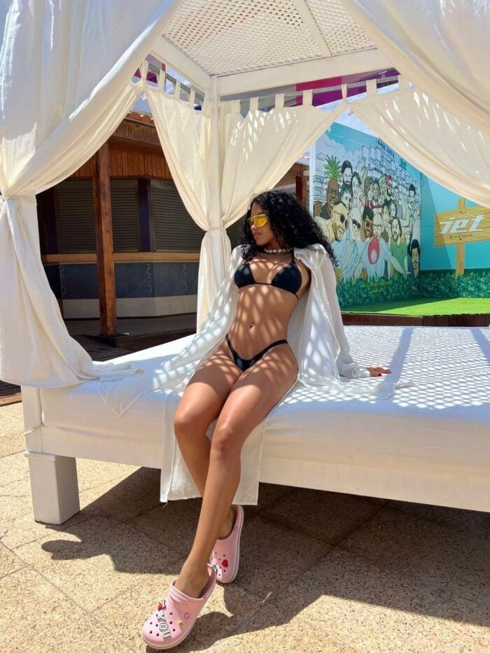 Megan luxury whore in Ibiza sitting on a Balinese bed Megan luxury whore in Ibiza sitting on a Balinese bed